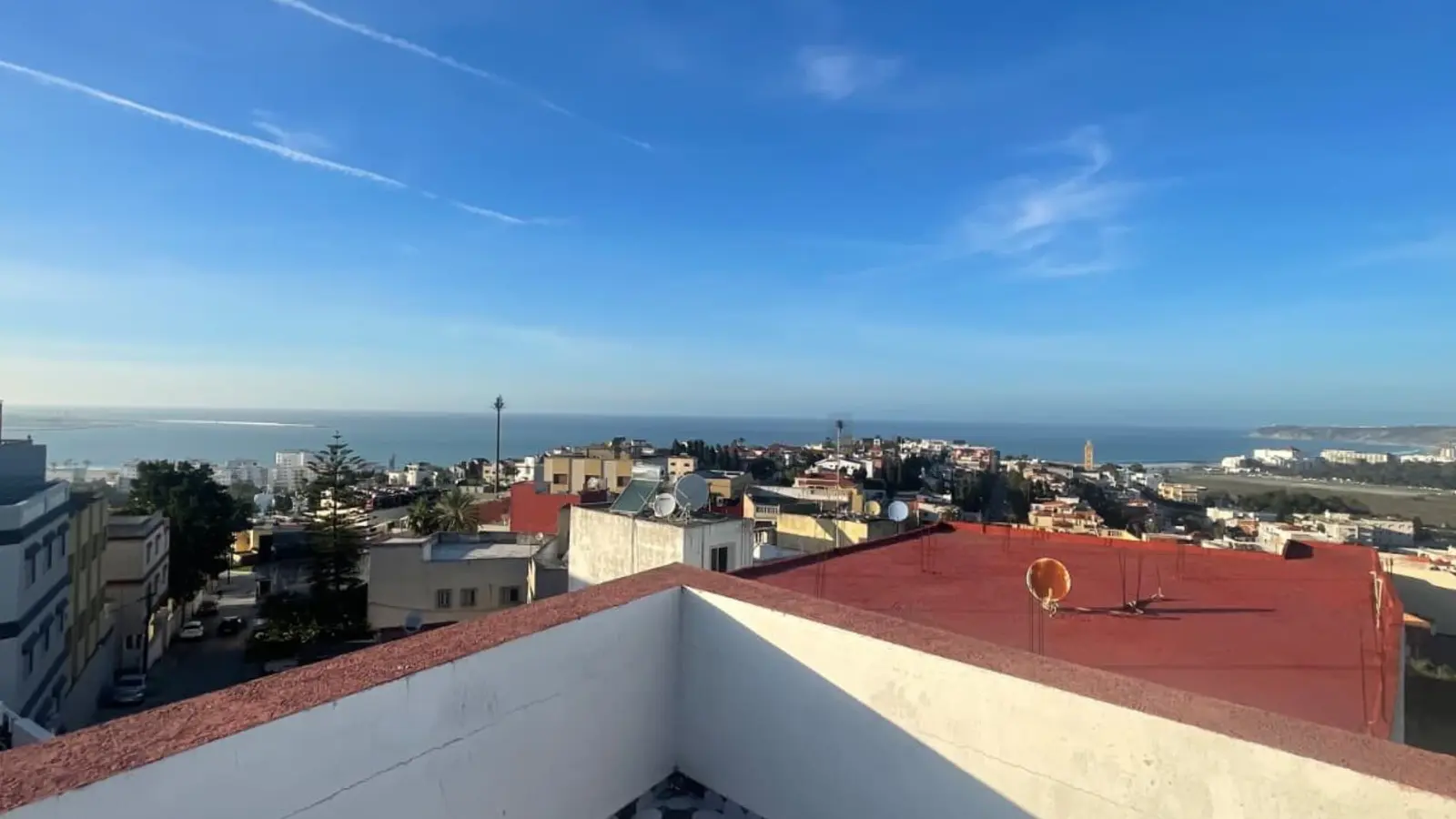 Sea view across Tangier from the shared rooftop terrace