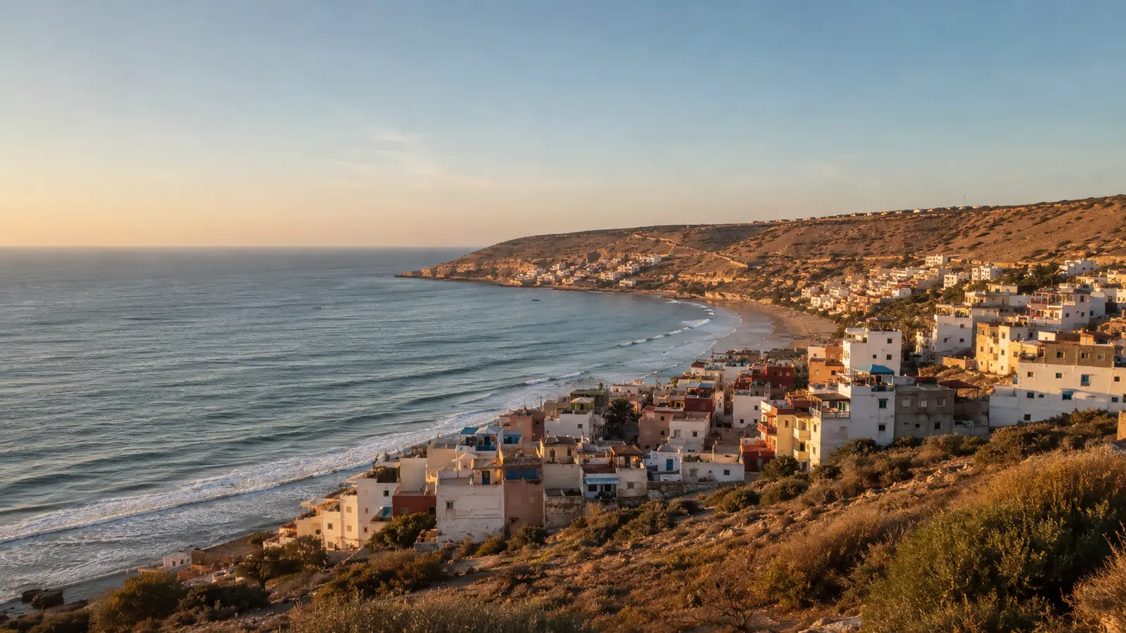 Taghazout village and Atlantic headland in golden evening light